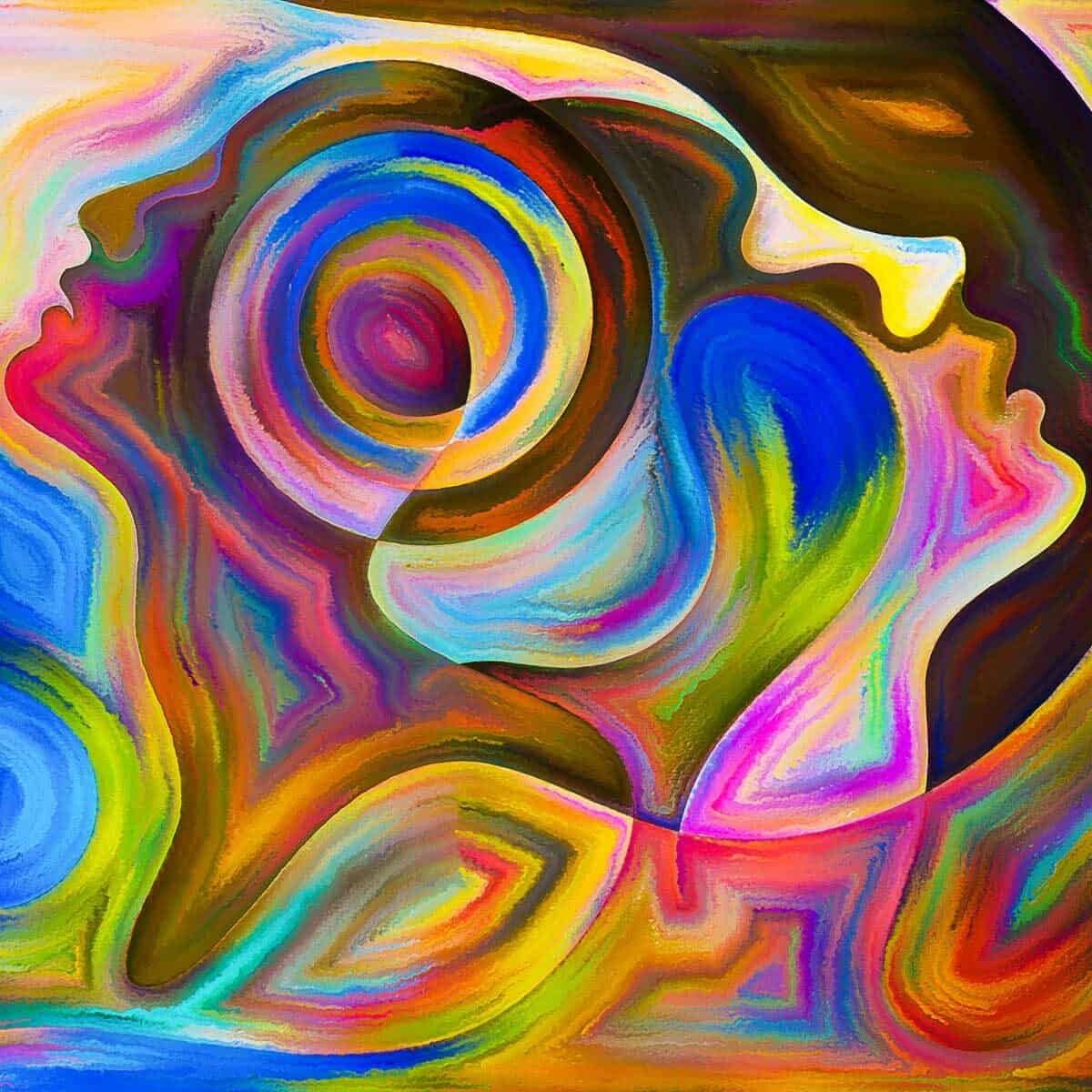 Two faces of a woman combined, back to back with swirls of color exhibiting emotions.